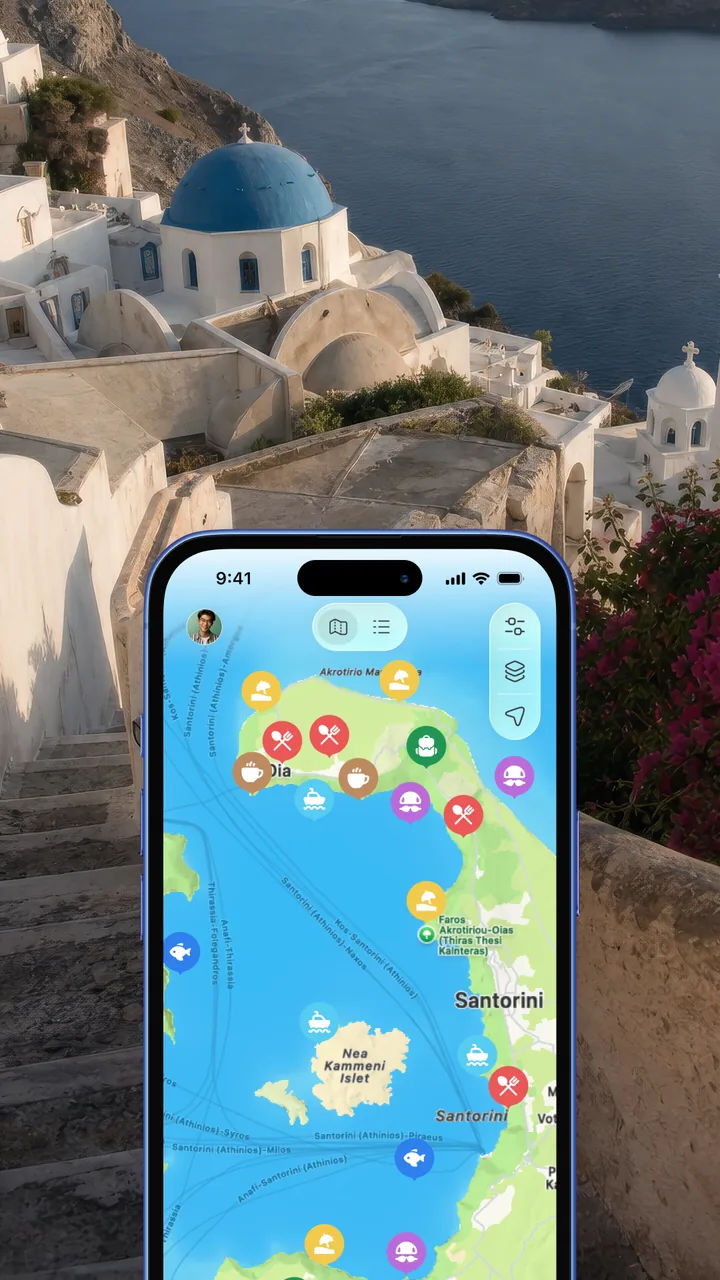 Pin Drop on a phone above the caldera in Santorini, showing a map covered in saved places.